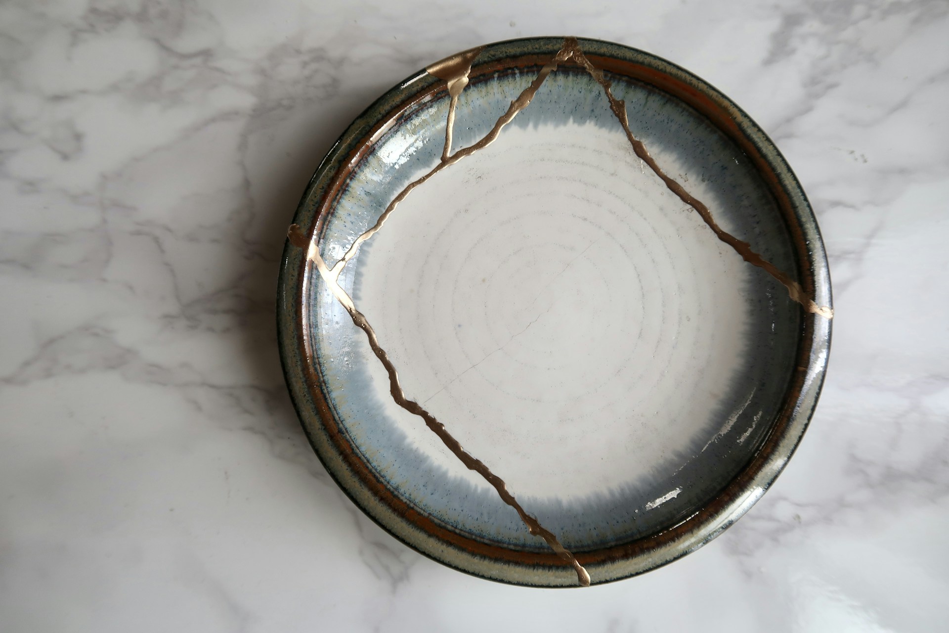 Kintsugi Meaning: The Japanese Art of Fixing Broken Pottery With Gold